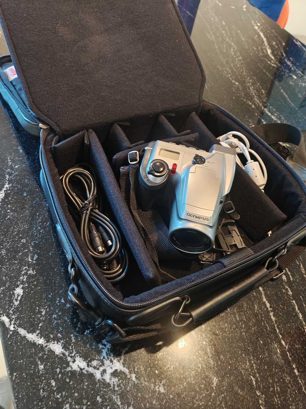 Olympus Silver Digital Camera with Carrying Case
